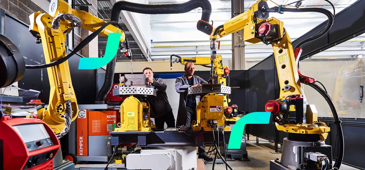 MTC engineers working with robotic arms